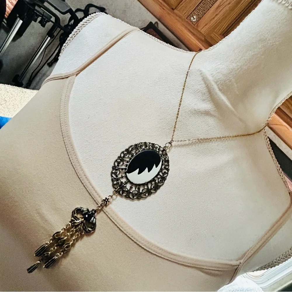Handcrafted Cruella de Vil cameo bat accent pendant on chain necklace